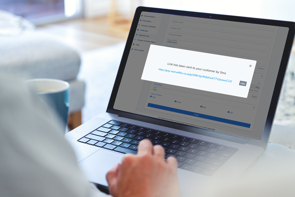 Laptop showing payment link interface